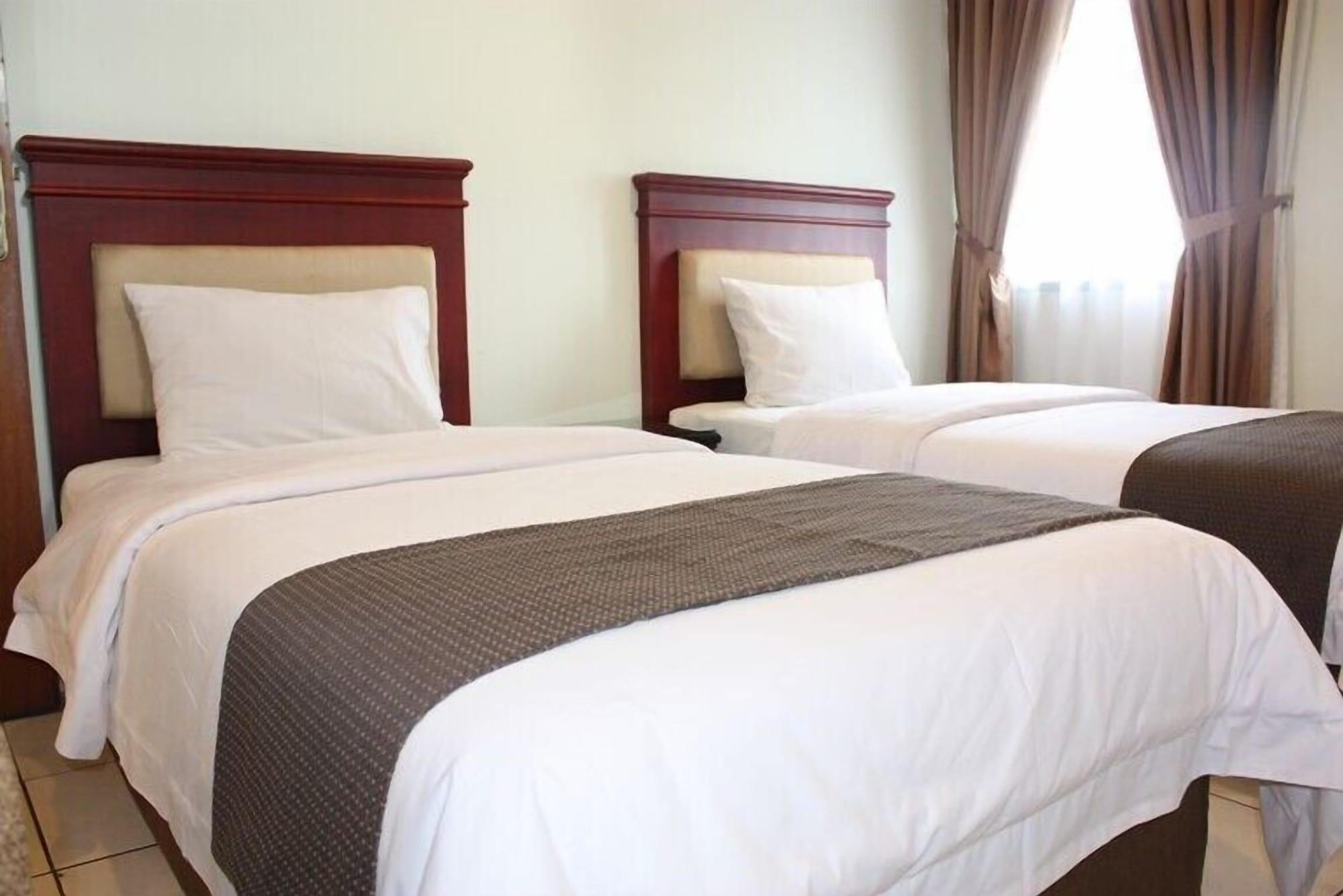 Travellers Suites Serviced Apartments Μεντάν Εξωτερικό φωτογραφία